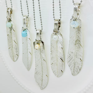 feathers made from silver plated butter knives