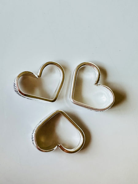 Vintage silver plated heart Triumph