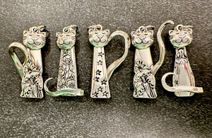 Cats made from silverware