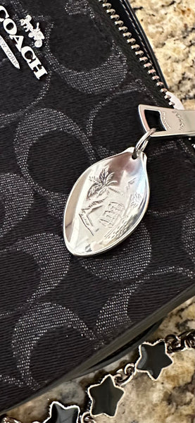 Rolex Spoon Ring and corresponding spoon bowl charm.